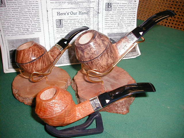 These are the pipes in 015 shape rhodesian curved with sterling band printed
on DWT2003...