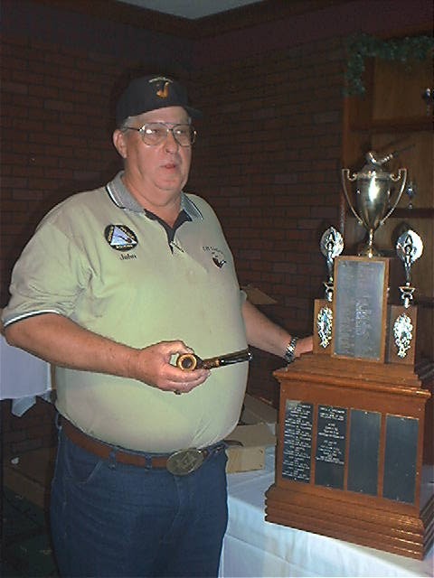 Here is John with the traveling trophy and the Bonfiglioli pipe that won the contest...