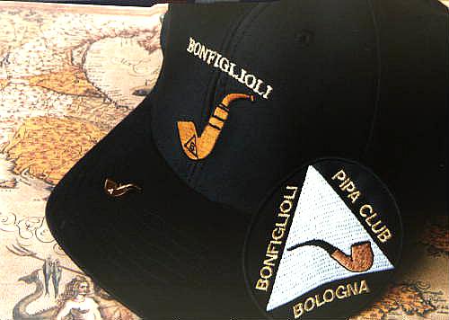 Hat,pin and logo of Bonfiglioli....